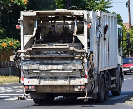 Operatives using PPE during commercial waste collection